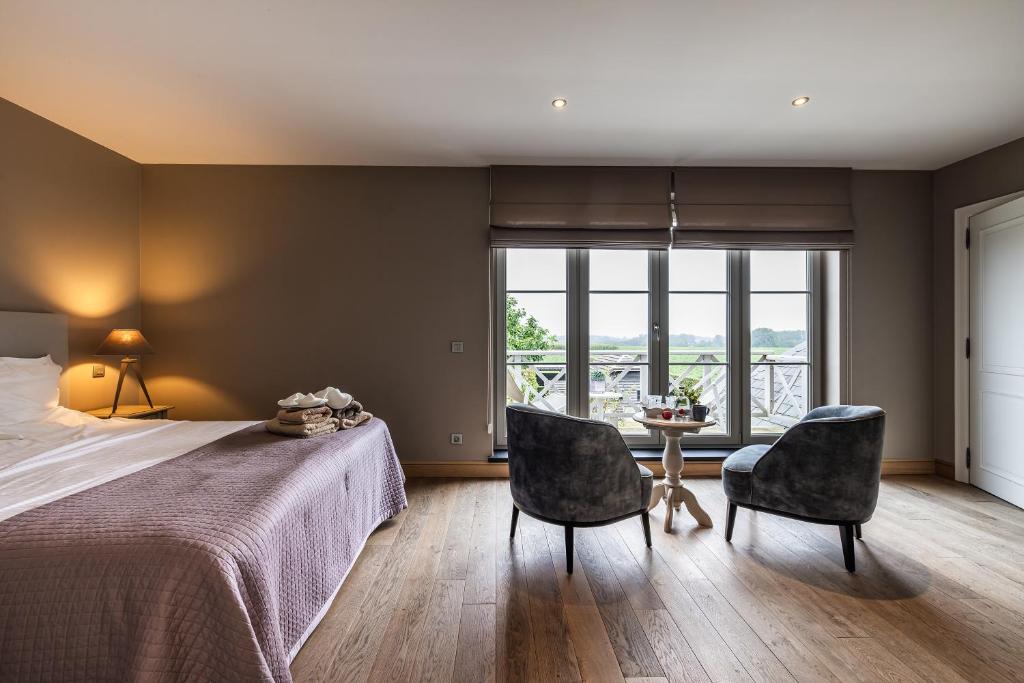 Postel nebo postele na pokoji v ubytování B&B La Cereza