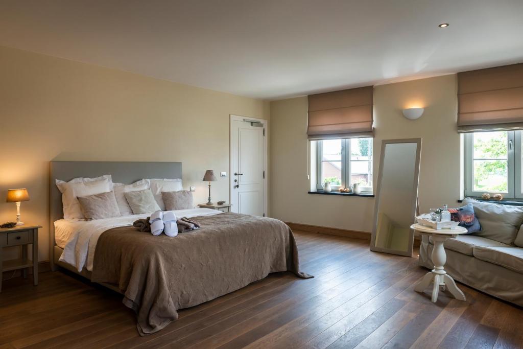 Postel nebo postele na pokoji v ubytování B&B La Cereza