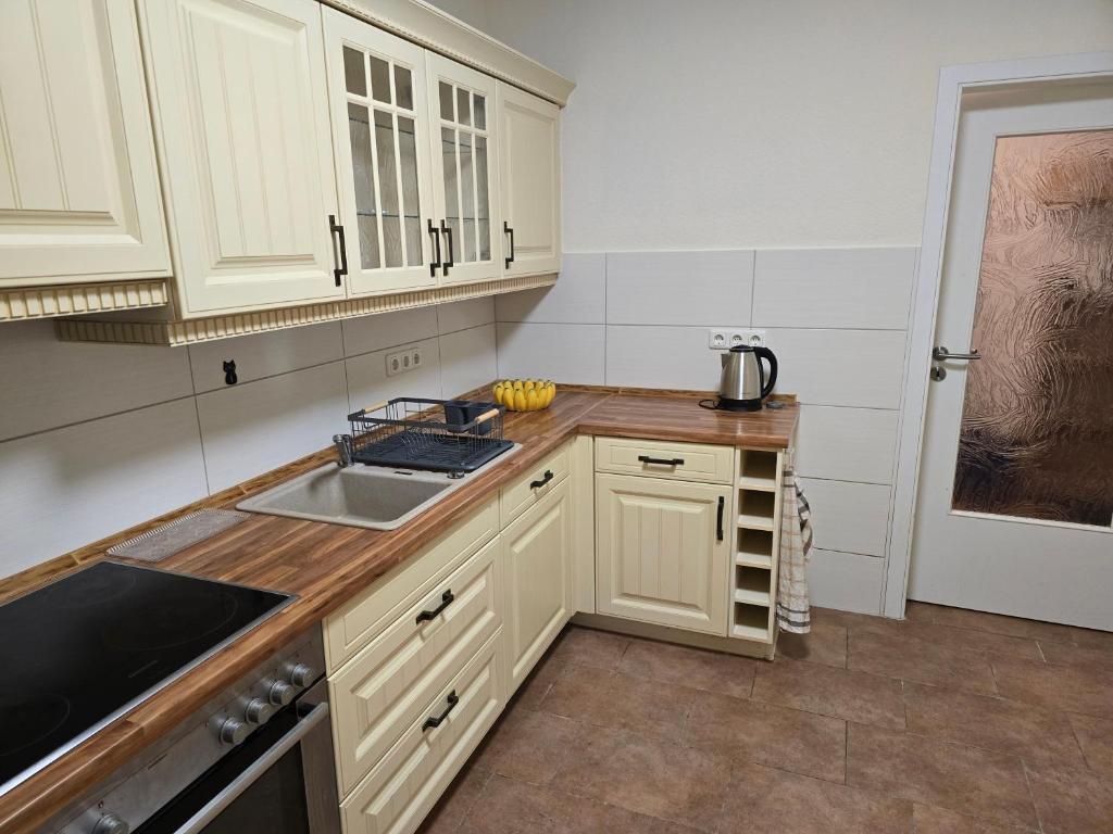 Kuchyň nebo kuchyňský kout v ubytování Ferienhaus 1 Wiesenperle