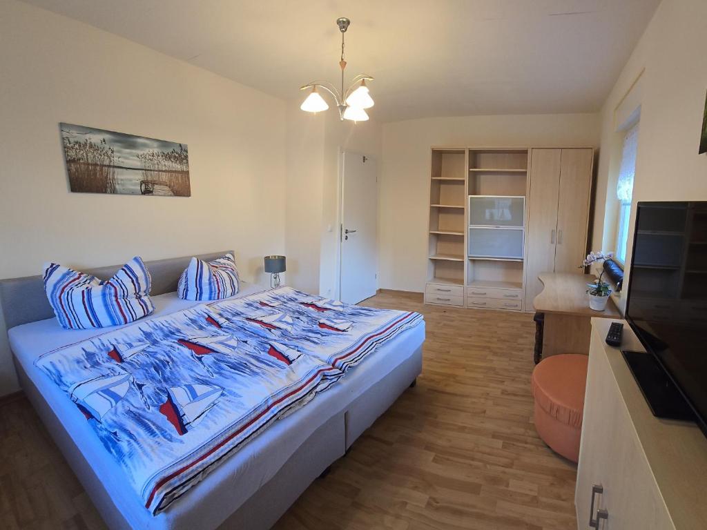 Postel nebo postele na pokoji v ubytování Ferienhaus 1 Wiesenperle