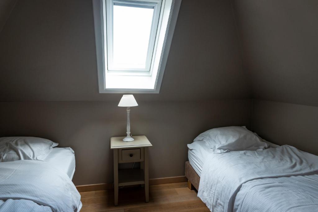 Postel nebo postele na pokoji v ubytování B&B La Cereza