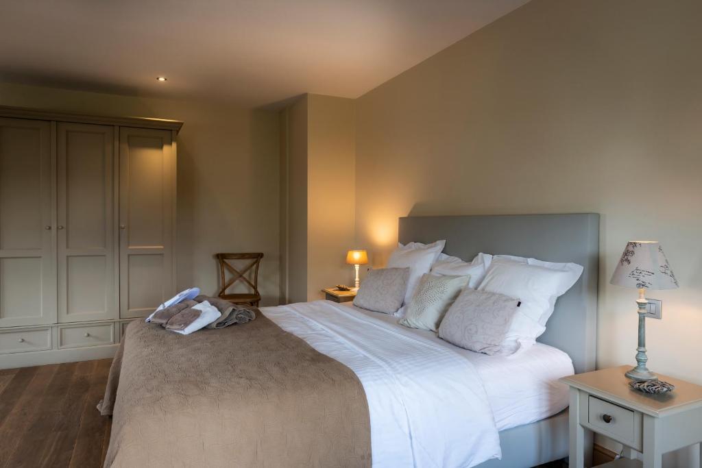 Postel nebo postele na pokoji v ubytování B&B La Cereza