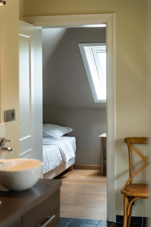 Postel nebo postele na pokoji v ubytování B&B La Cereza
