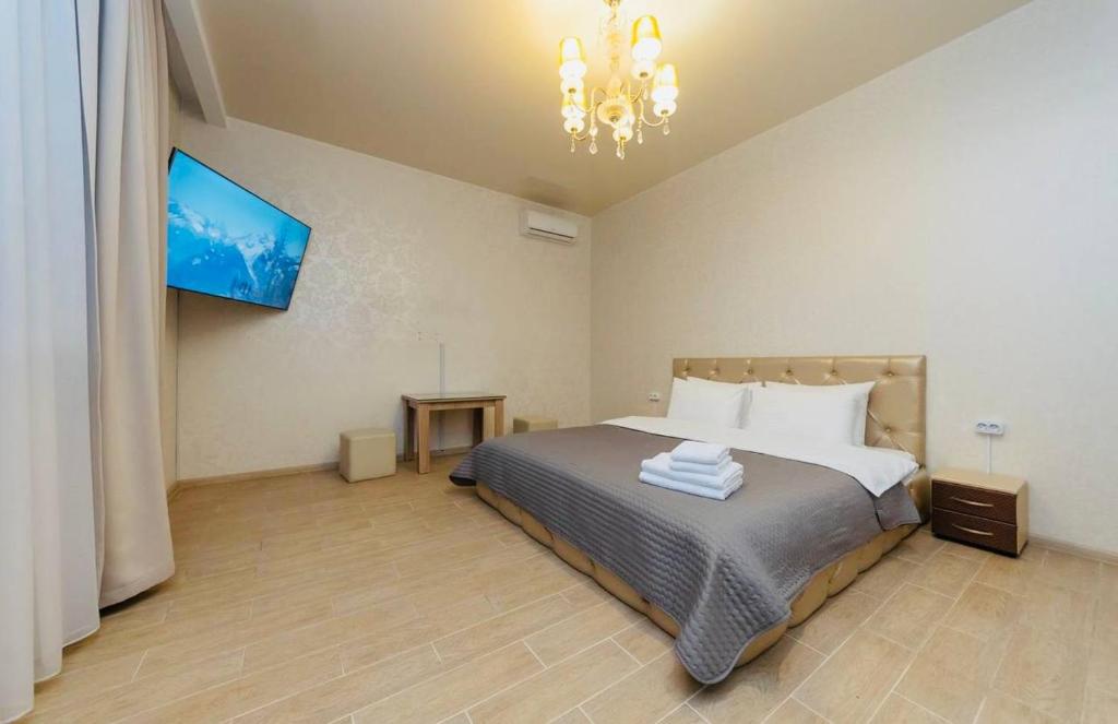 Postel nebo postele na pokoji v ubytování Viktoriya Family 2 Country complex