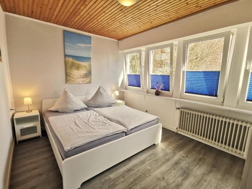 Postel nebo postele na pokoji v ubytování Wohnung 60