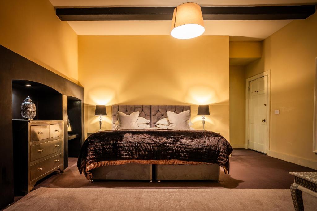 Postel nebo postele na pokoji v ubytování Six Brunton Place Guest House