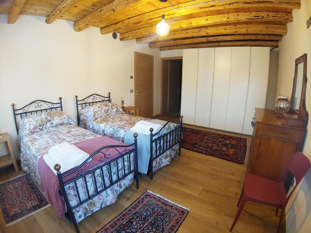 Postel nebo postele na pokoji v ubytování Casa Simoni