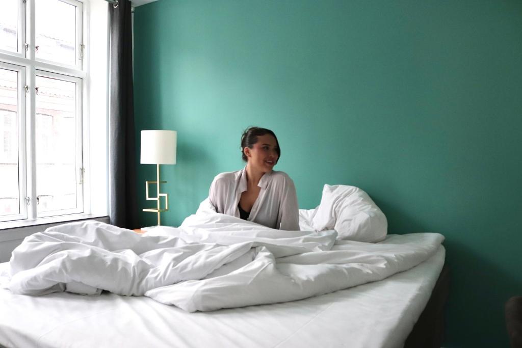 Postel nebo postele na pokoji v ubytování A Hotels City