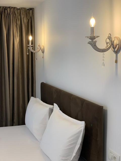 Postel nebo postele na pokoji v ubytování Hotel Nalba-Dalia Jupiter