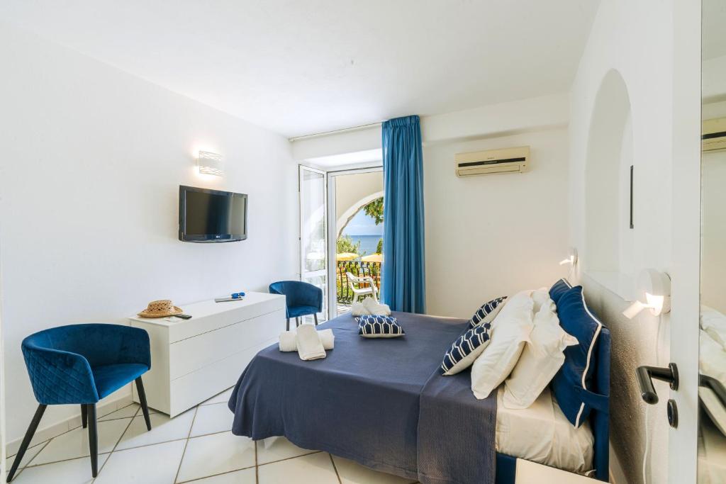 Μια τηλεόραση ή/και κέντρο ψυχαγωγίας στο Gardenia Mare Apartments