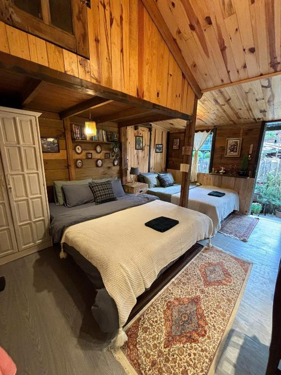 Postel nebo postele na pokoji v ubytování Soul PnB Homestay