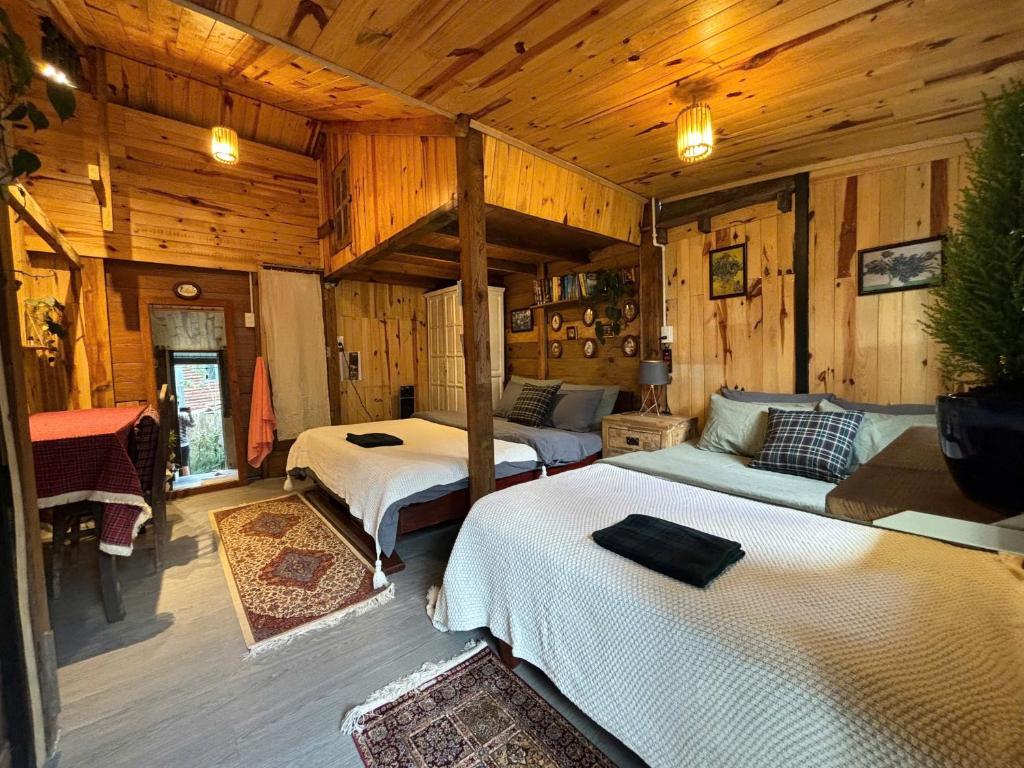 Postel nebo postele na pokoji v ubytování Soul PnB Homestay