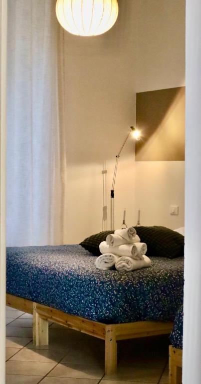 Postel nebo postele na pokoji v ubytování CinqueTerre Casa Simón La Spezia