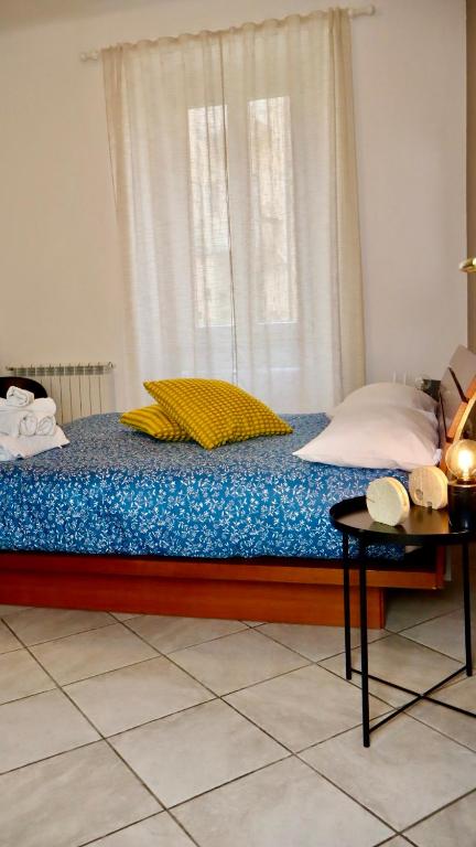 Postel nebo postele na pokoji v ubytování CinqueTerre Casa Simón La Spezia