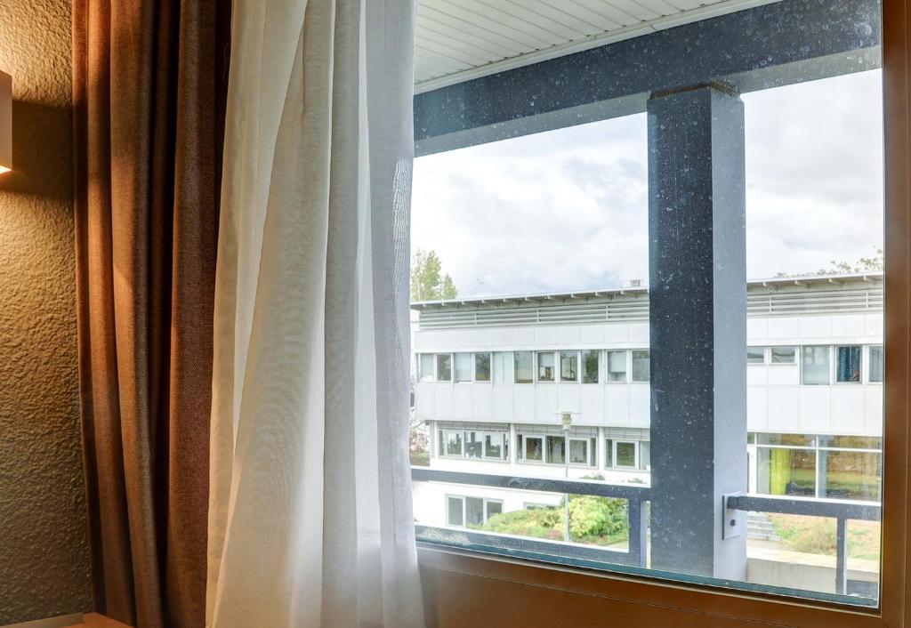 Balkón nebo terasa v ubytování B&B HOTEL Dijon Marsannay