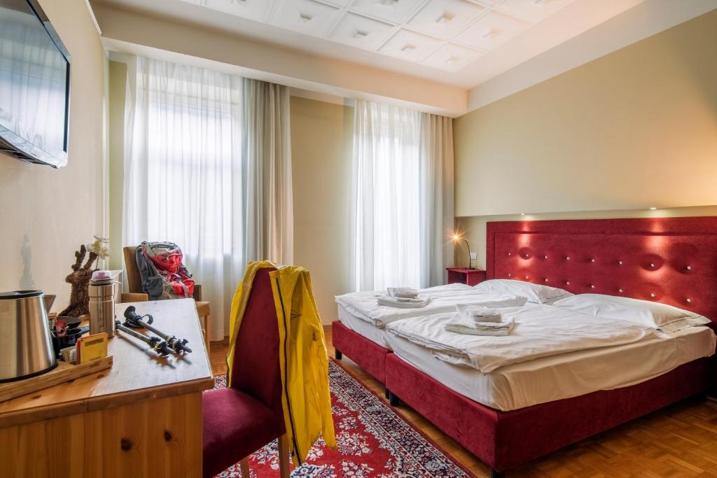 Postel nebo postele na pokoji v ubytování HOTEL AURONZO - outdoor basecamp