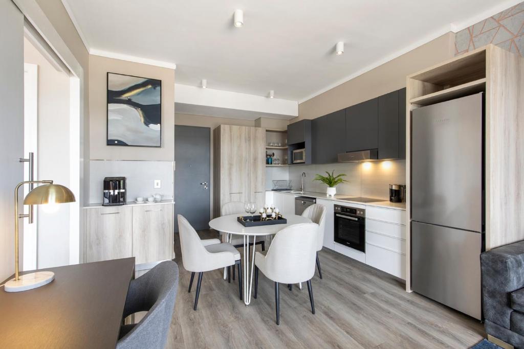 Kuchyň nebo kuchyňský kout v ubytování Menlyn Apartment