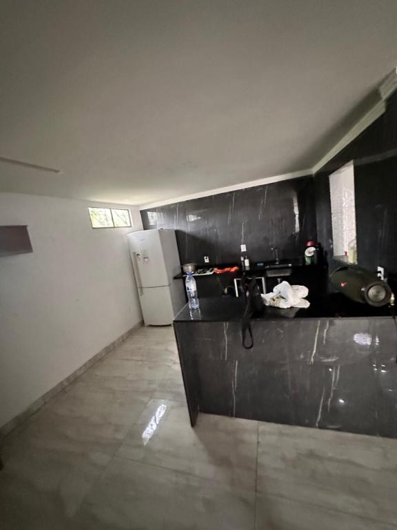 Kuchyň nebo kuchyňský kout v ubytování Casa Jr paz e amor