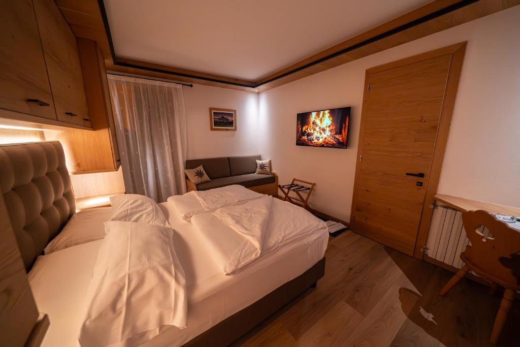 Zdjęcie z galerii obiektu HOTEL FONTANA w mieście Sappada