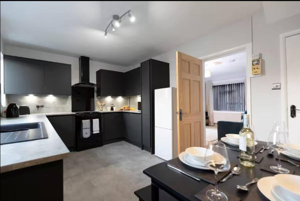 Køkken eller tekøkken på Vacant Nests The Carrick Beach Golf Course