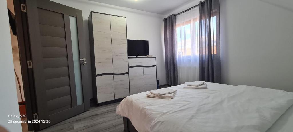 Ένα ή περισσότερα κρεβάτια σε δωμάτιο στο Casa Alex