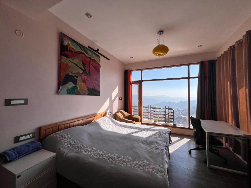 Ένα ή περισσότερα κρεβάτια σε δωμάτιο στο Hillspeak Homes