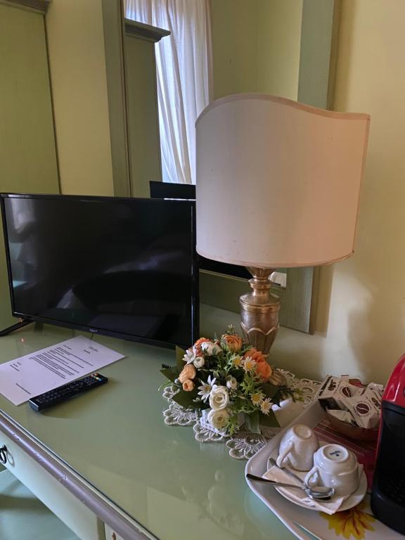TV a/nebo společenská místnost v ubytování Villa Orsini