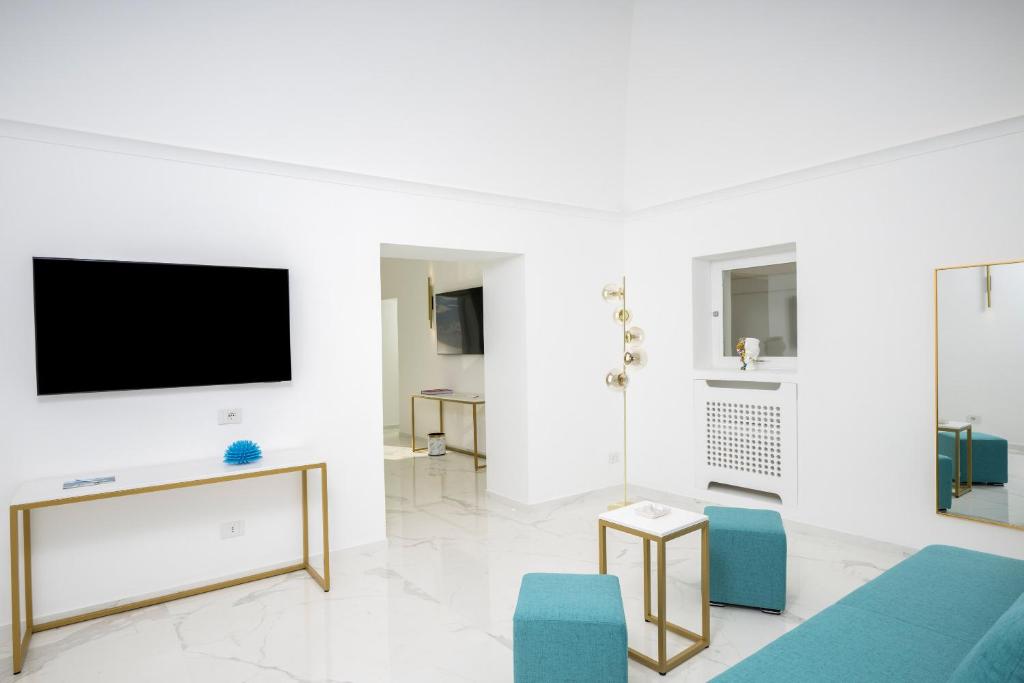 TV a/nebo společenská místnost v ubytování Gianlica Suites Positano