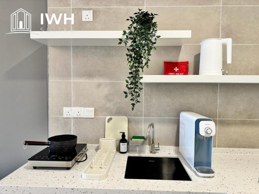 Kuchyň nebo kuchyňský kout v ubytování ICC Ipoh Town Premium Suites By IWH Suites