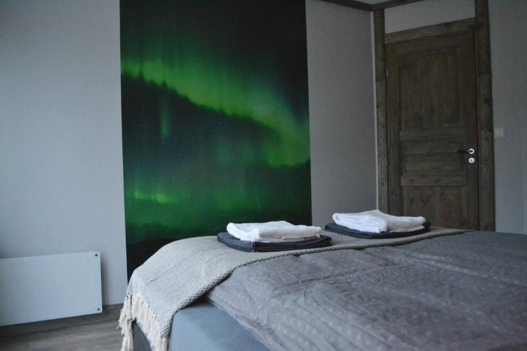 Postel nebo postele na pokoji v ubytování Fredvang Seahouse, Apartment B