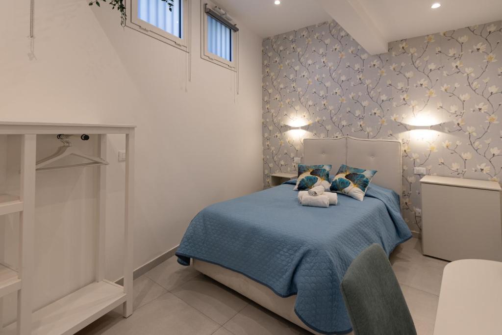Posteľ alebo postele v izbe v ubytovaní Villa Valverde Apartments e B&B