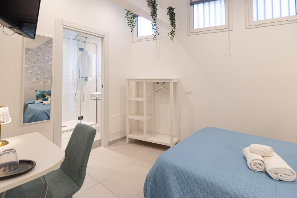 Posteľ alebo postele v izbe v ubytovaní Villa Valverde Apartments e B&B
