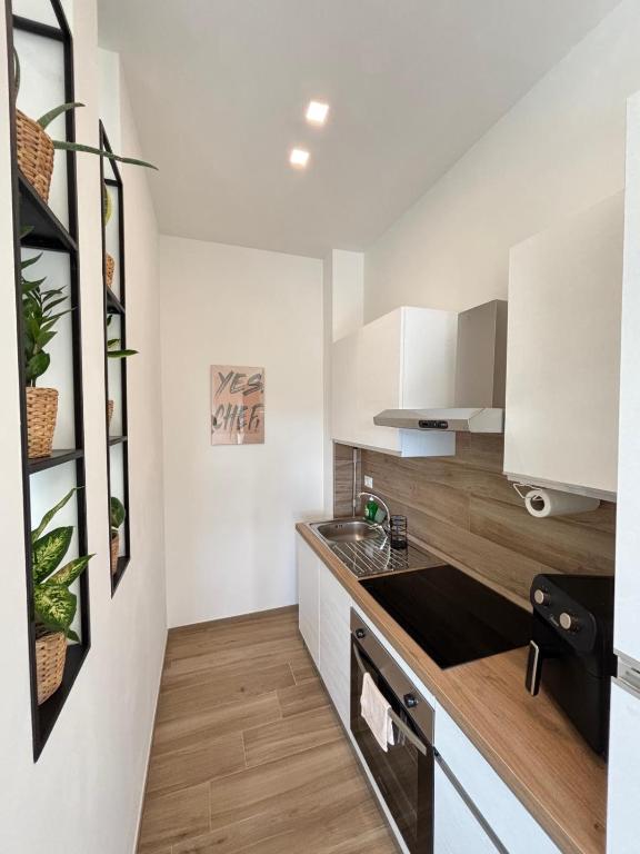 Kuchyň nebo kuchyňský kout v ubytování Le Terricate B&B