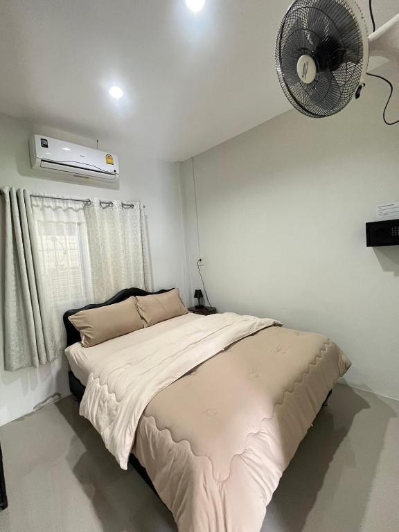 Postel nebo postele na pokoji v ubytování Yada House