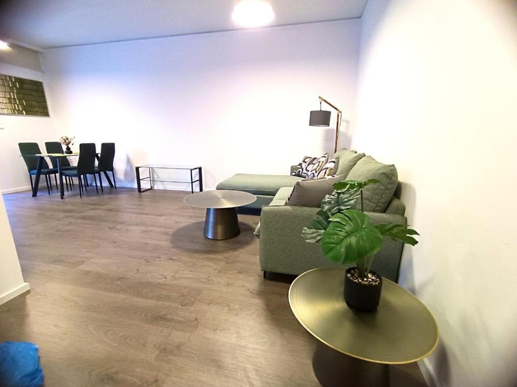 a living room with a couch and a table at Casa Dina Nea Chora in Chania Town