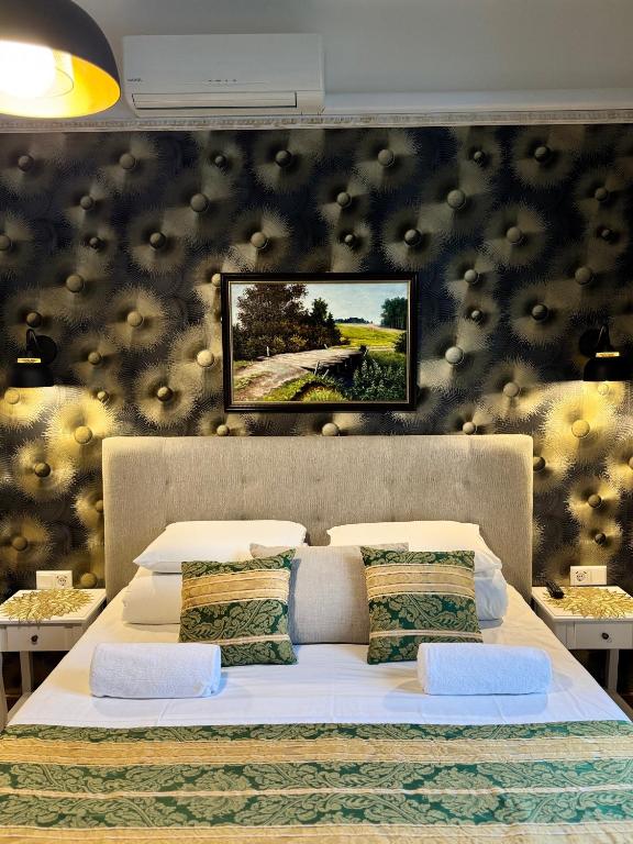 Postel nebo postele na pokoji v ubytování Green Villa