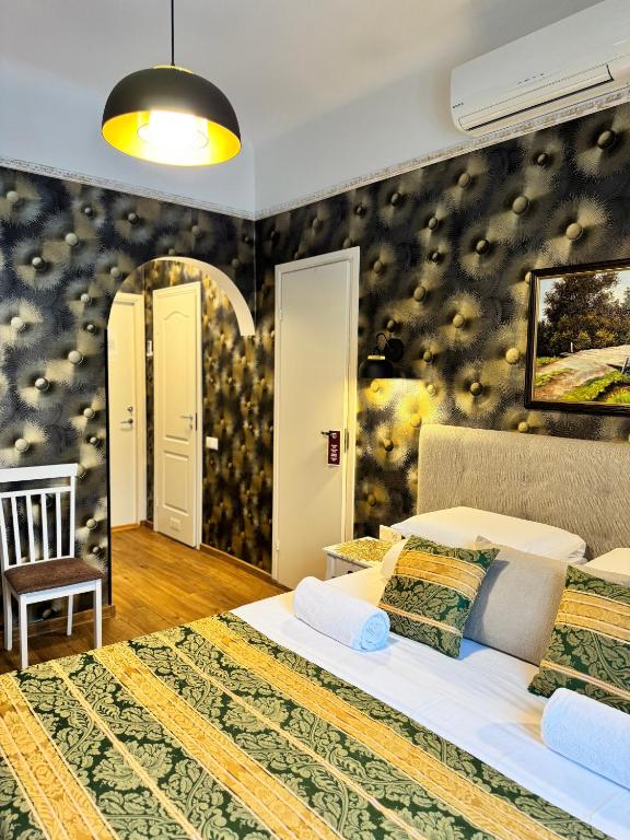 Postel nebo postele na pokoji v ubytování Green Villa