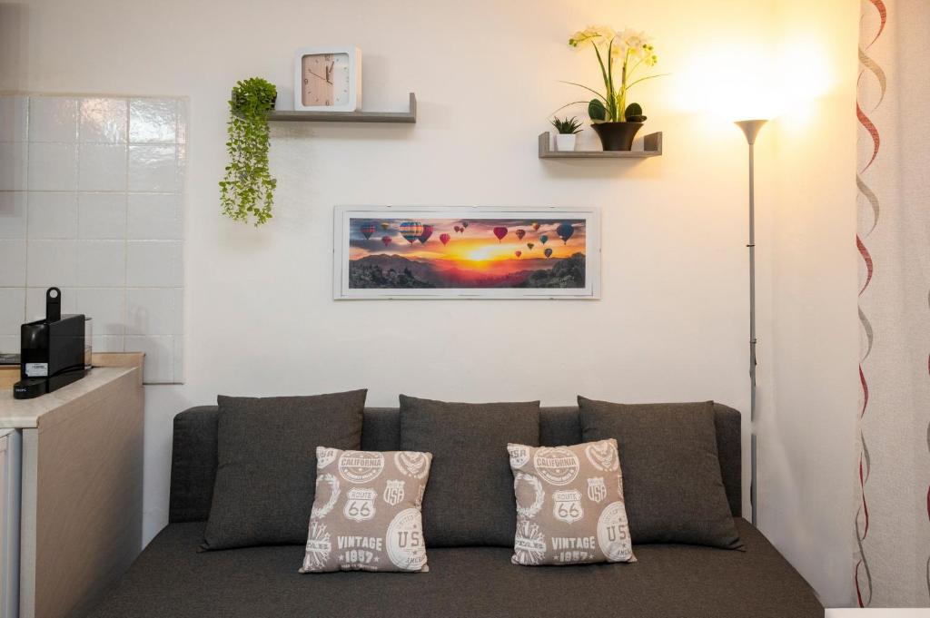 Posezení v ubytování LE MURA Station Modern House - Parcheggio & Wi-Fi Gratis