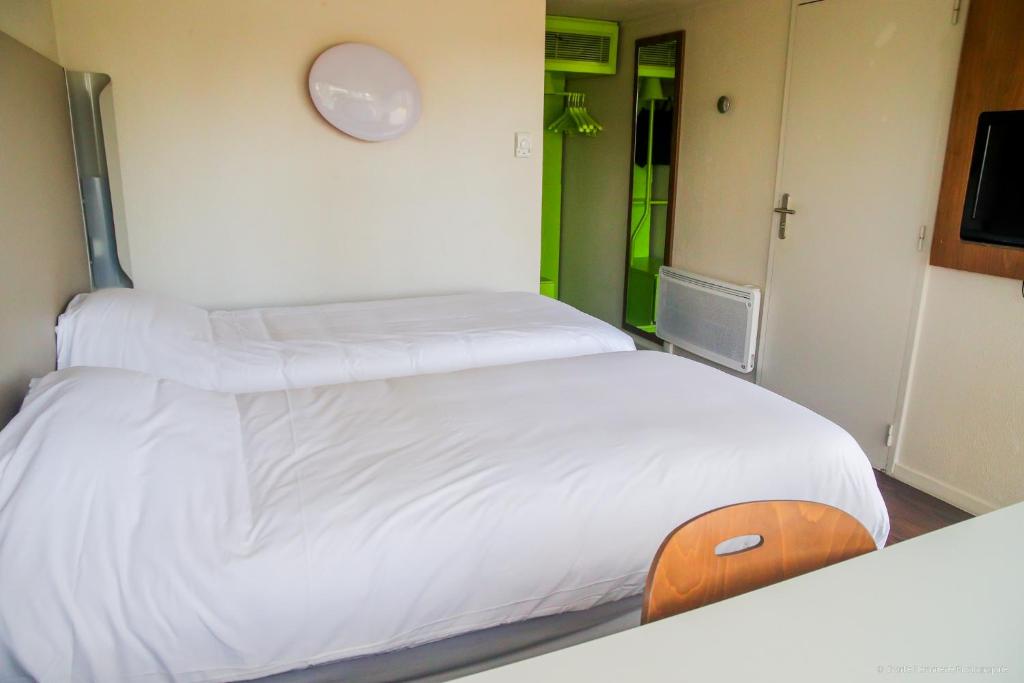 Postel nebo postele na pokoji v ubytování Campanile Montargis - Amilly