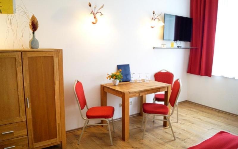 TV a/nebo společenská místnost v ubytování Fürstenhof Landgasthaus & Hotel