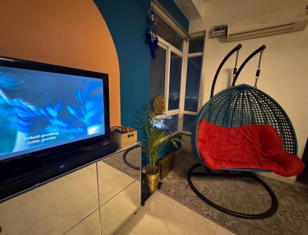 Televiisor ja/või meelelahutuskeskus majutusasutuses Two passengers xostel