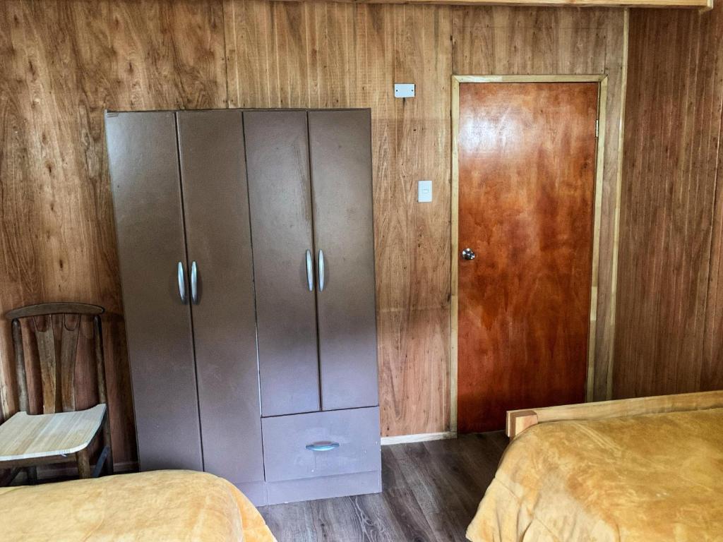 Postel nebo postele na pokoji v ubytování Hostel Los Teros