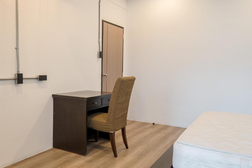 Postel nebo postele na pokoji v ubytování Silom Condominium