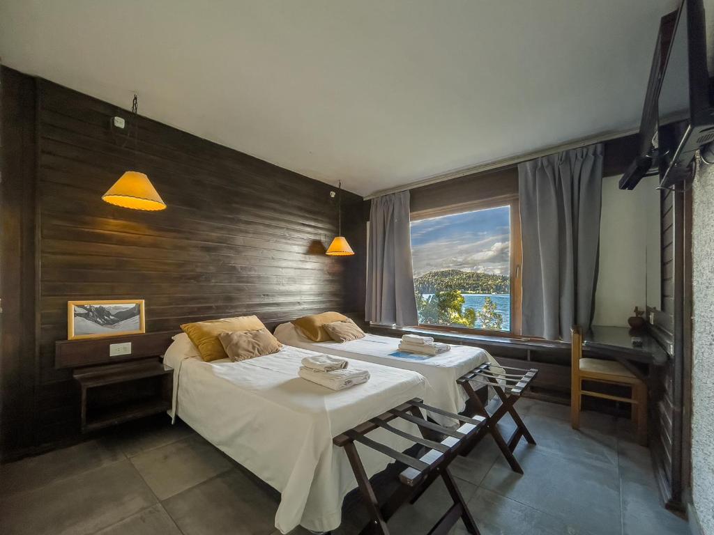 Postel nebo postele na pokoji v ubytování Hosteria Santa Rita