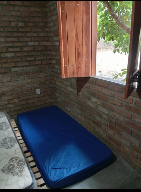 Postel nebo postele na pokoji v ubytování Cantinho HAKUNA MATATA-Vale do Capão a 5 min da Vila