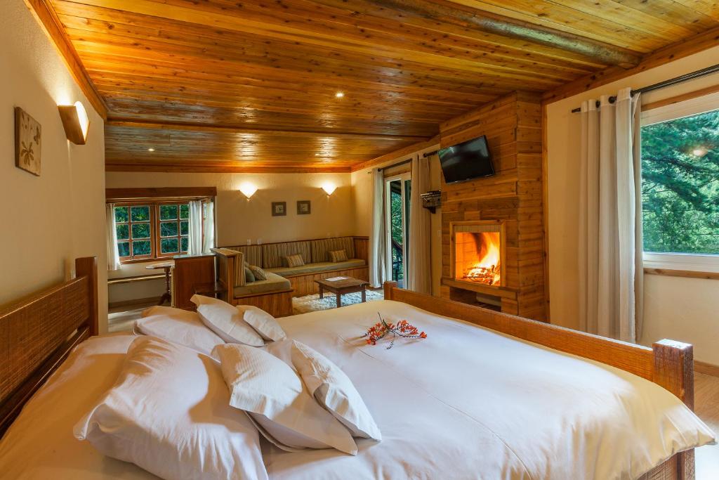 Postel nebo postele na pokoji v ubytování Hotel Fazenda Itapuá
