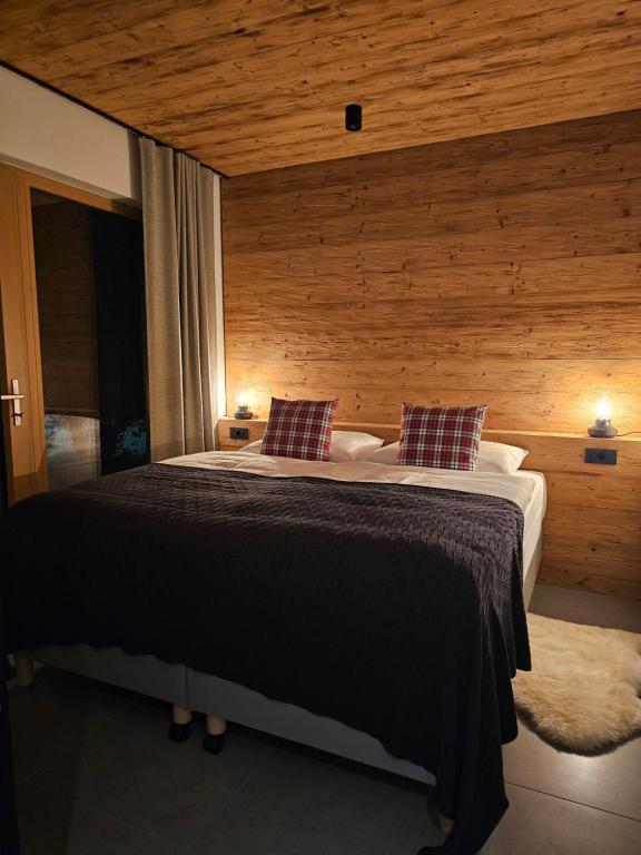 Postel nebo postele na pokoji v ubytování Apartmaji štAla