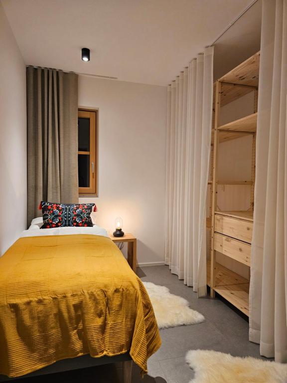 Postel nebo postele na pokoji v ubytování Apartmaji štAla
