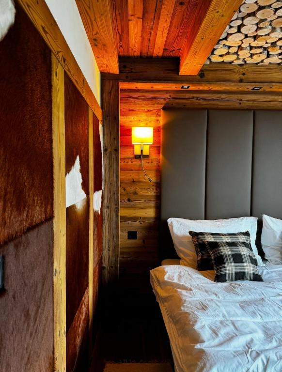 Postel nebo postele na pokoji v ubytování Apartment Líška with view of High Tatras and private sauna