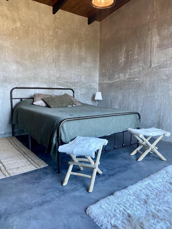 Postel nebo postele na pokoji v ubytování Prajna Valle de Guadalupe